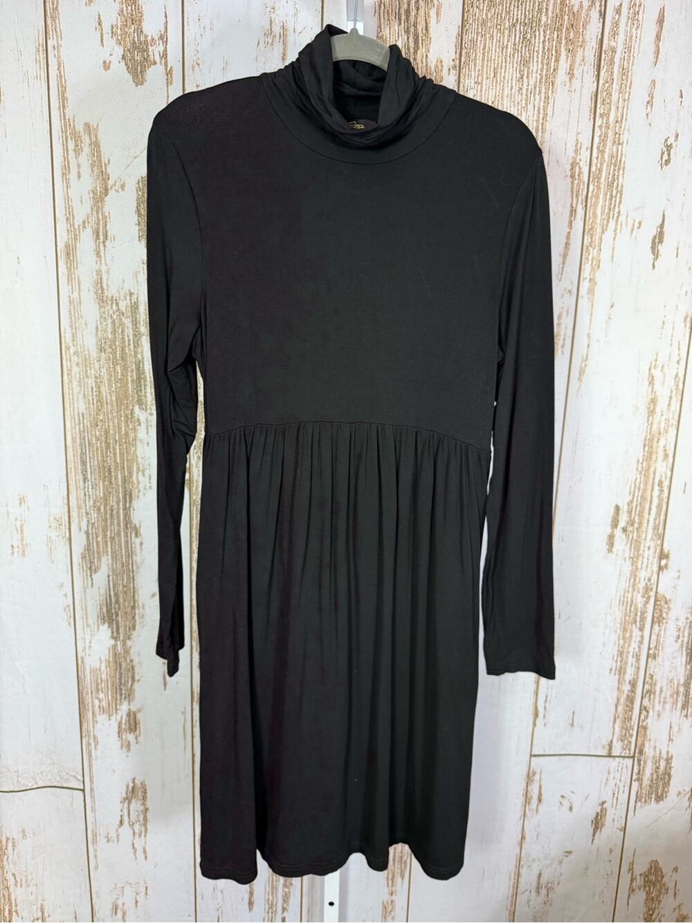Suzanne Betro, Black Long-Sleeve Turtleneck Dress with Pockets. Size Small.